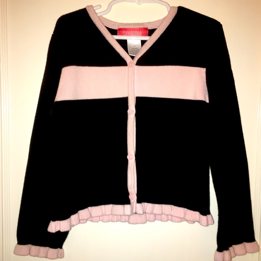 Black cardigan with pink trim